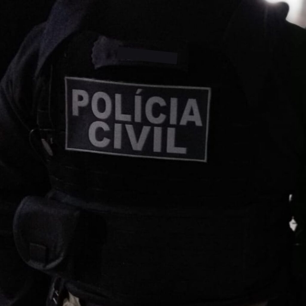 colete da policia civil de costas